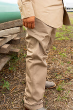Side view of the khaki FR COOLBACKS® Work Pants showing the straight-leg fit